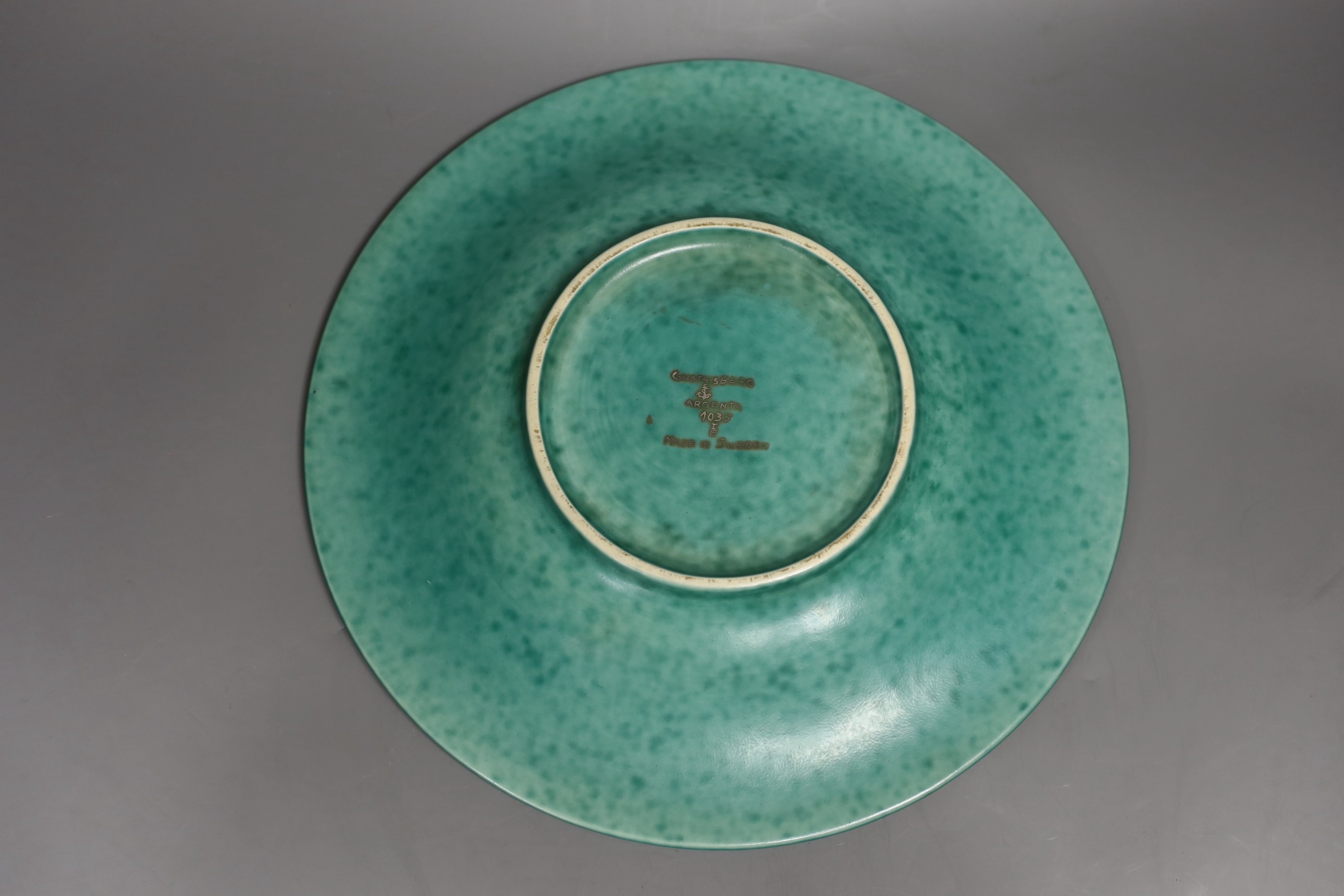 A Gustavsberg Wilhelm Kåge design Argenta 1035 shape dish decorated with fishes, 30cm diameter